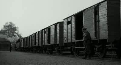 MAN ON PA: Attention, attention. - Schindler's List