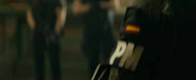 [man on PA in Spanish]
Please, remain inside
the building... - The Vault