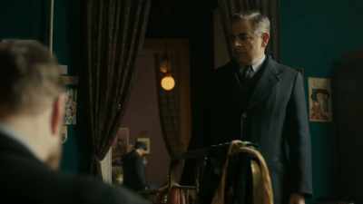 Man? Or a woman
with very big hands. - Maigret in Montmartre