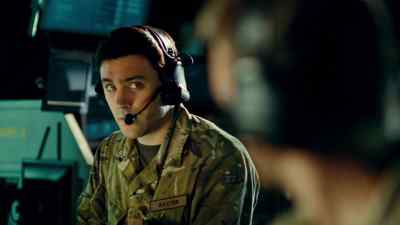 [MAN SPEAKING INDISTINCTLY ON TV] - Strike Back