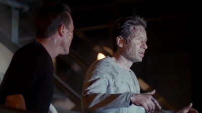 (man speaking indistinctly
over P.A.) - The X-Files