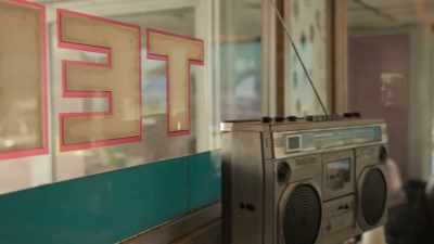 [man speaking indistinctly
over radio] - On Becoming a God in Central Florida