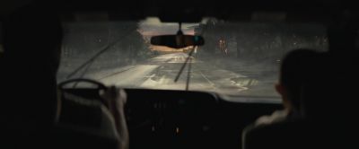    (man speaking indistinctly
          over radio) - Knock at the Cabin