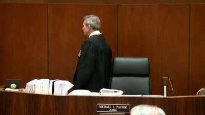 Man:
The honorable Michael E. Pastor
Judge presiding, - How It Really Happened