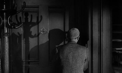 Man with a hammer bumps a buck - The Man with the Golden Arm