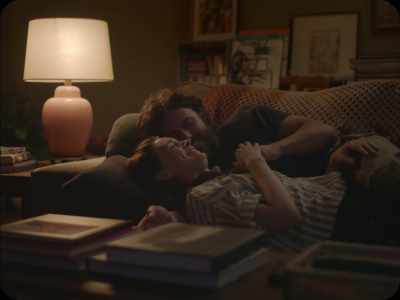 [man and woman chuckling together] - A Ghost Story