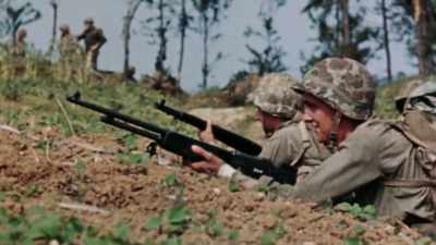 Many keep their guns stowed, and
never have to dig a foxhole. - The Pacific War in Color