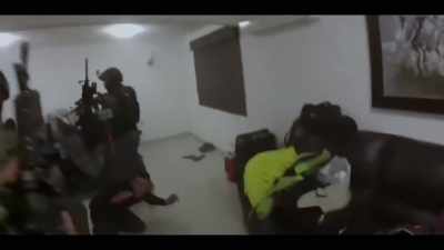 [Marine officers shouting indistinctly,
in Spanish] - World's Most Wanted