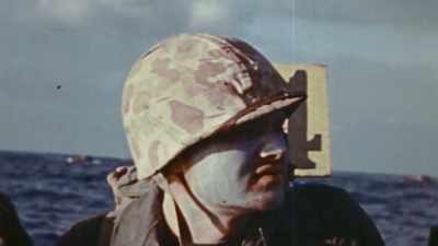 Marines smear their faces
with white anti-flash cream - The Pacific War in Color