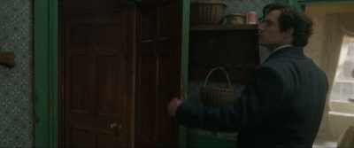 Marks on and around the door
show that it was forced open, - Enola Holmes 2