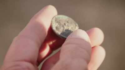 MATTY:
This is a military-type button - Beyond Oak Island