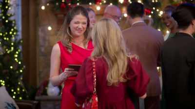 Maybe.
(giggling) - Meet Me Under the Mistletoe