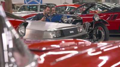 -Maybe we should take another car.
-[laughs] - Buying Beverly Hills