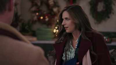 Maybe someone to hold the
wrapping paper in place - Christmas Wreaths and Ribbons
