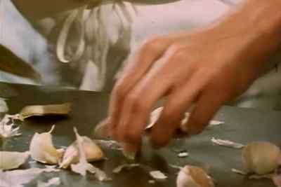 —♪♪ [ Guitars: Flamenco ]
—[ Men Shouting ] - Garlic Is as Good as Ten Mothers