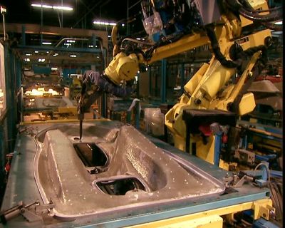 MEANWHILE,
A ROBOT WORKS ON THE DECK. - How It's Made