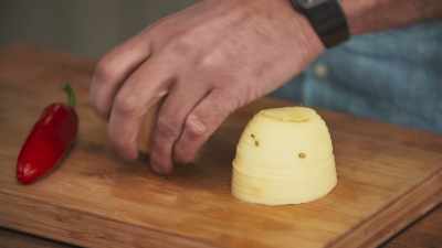Mechanically-peeled potatoes,
quartered by hand - James May: Oh Cook!