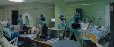 (medical staff chattering) - This England