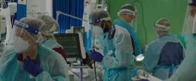 (medical staff chattering) - This England