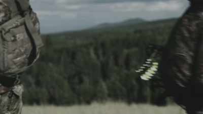 Mel pointed at a group of trees - Missing 411: The Hunted
