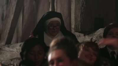  -[melodic rock and roll music]
 -[audience cheering] - Sister Boniface Mysteries