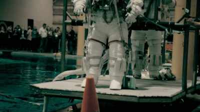 MELVIN: As you're going down
in the spacesuit, - One Strange Rock