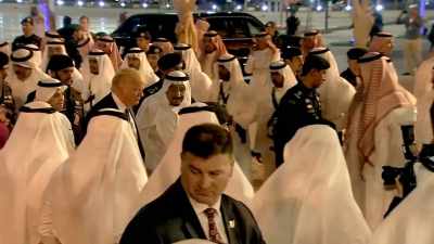 - [men] chanting in Arabic
- [drums beating] - Kingdom of Silence