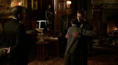 (men chattering in russian,
laughter) - Gotham