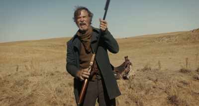 -[men hooting, firing guns]
-[thundering hooves] - The Ballad of Buster Scruggs