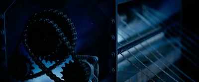 - [metal clicks]
- [warning buzzer] - Spiral: From the Book of Saw