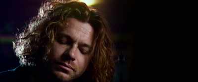 Michael: My head was smashed
onto a road. - Mystify: Michael Hutchence