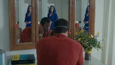 [Michel speaking indistinctly
through headphones] - The Little Drummer Girl