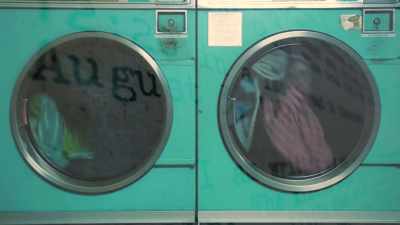 - [Mike] "12:20 PM in a
laundromat in Cincinnati. - Shadow of a Wheel