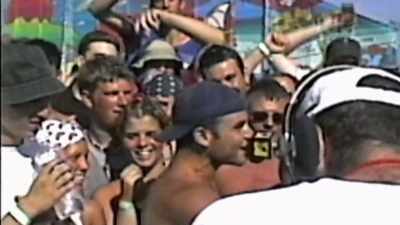 MIKE: People are screaming,
"Stick it up your ass," - Woodstock 99: Peace Love and Rage