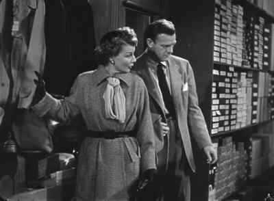 - Mind if I look at this coat?
- That's a man's coat. - Woman on the Run