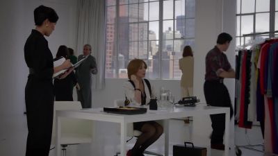 MISS FORD:
She didn't get in the car? - Pose