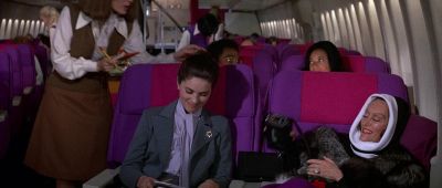 Miss Swanson can I get you something from the bar - Airport 1975