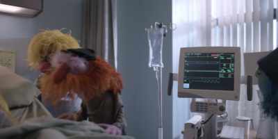- (MONITOR BEEPING)
- WOMAN ON PA: Paging Dr. Ostowitz. - The Muppets Mayhem