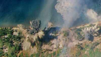 More shelling, more landing
craft, and more air support. - The Pacific War in Color