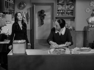 - Mother.
- Doing dishes. - The Addams Family