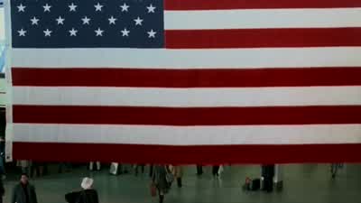 Mr. Frank oznowitz, please pick up a white courtesy telephone. - Coming to America