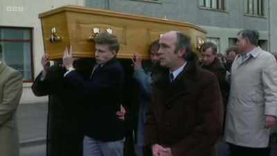 Mr Kielty's eldest sons, John
and Patrick, carried the coffin. - Once Upon a Time in Northern Ireland