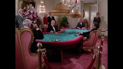 Mr. Lucas wins
with a natural eight. - The Love Boat