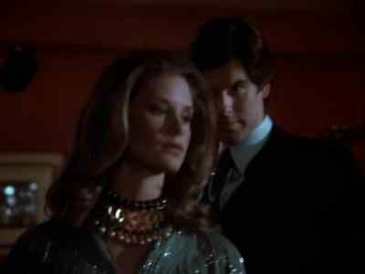 - Mr. Steele's table, please.
- Oh yes. This way, please. - Remington Steele