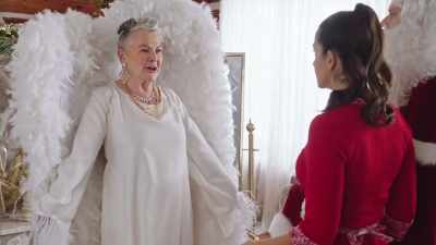 Mrs. Claus has turned
into a magnificent angel. - Laughing All the Way