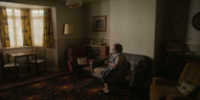 Mrs. Hodgson is
sitting on the, settee. - The Enfield Poltergeist