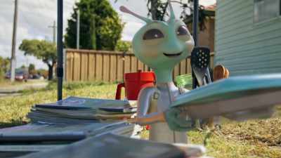 [muffled giggling] - Alien TV