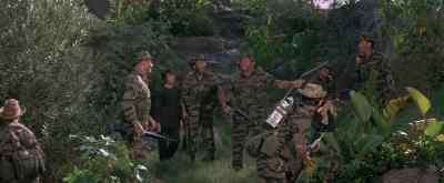 MULDOON:
LZ is a meadow just over that rise. - The Green Berets