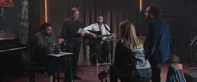 Music comes from his apartment.
-Escaped? - Coexister