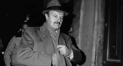 [music playing] - Murder of God's Banker